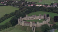 Framlingham Castle And Rise Up From Behind Trees