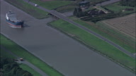Russian Ship Approaching Sutton Bridge (Brief Glimpse Of Ship Then Camera Track Away Across Fields)