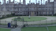Burghley House Start Low With Pull Out From Wrought Iron Gate To Show House