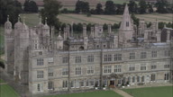 Burghley Park Trees Followed By Reveal Of Burghley House