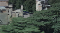 Harlaxton Manor C/U Behind Trees