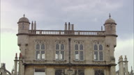 Wollaton Hall Low Shot From Front Of House Pull Out Into High Shot