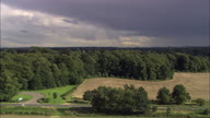 Thoresby Hall Revealed Behind Trees