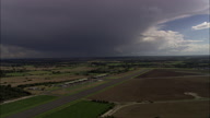 Landing At Gamston With Looming Dark Cloud And Helicopter Shadow