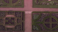 Zoom Out From C/U On Gardens An Doddington Hall Directly Down