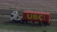 C/U Of Truck Crossing Humber Suspension Bridge - Low Shot Then Zoom Out To High