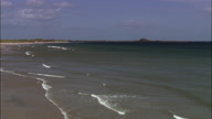 Low Over Sand And Sea Towards Holy Island