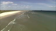 Low Over Sand And Sea Towards Holy Island