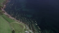 Northumberlnd Coast With Rocks In Calm Sea