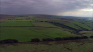 Exmoor And Back Lit Coast In Distance