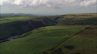 Exmoor And Back Lit Coast In Distance