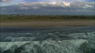 Good Low Track Over Breaking Waves At Braunton Sands