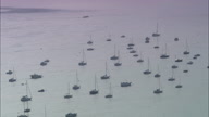 Yachts At Anchor In Glistening Estuary