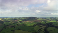 Dorset Countryside With Blue Sky And Fluffy Clouds