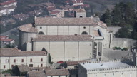 San Marino Cathedral With Pull Out To Reveal Government Palace And Town