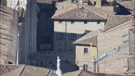 Pull Out From Close Of Urbino Cathedral To Reveal Town