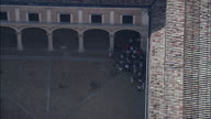 Pull Out From Courtyard Of Ducale Palace In Urbino Directly Down