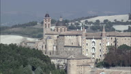 Ducale Palace In Urbino Reverse Reveal Behind Hill