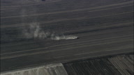 Tractor At Work In Field