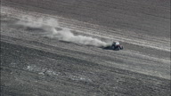 Tractor At Work In Field