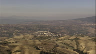 Small Towns Surrounded By Dry Farmland