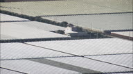 Polly Tunnels And Greenhouses Back Lit Near Taranto