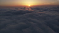 Descending Into The Clouds At Sunset