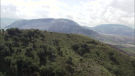 Over A Hill To Reveal Quarry And Hills On The Way To Salemi