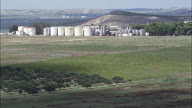 Wine Storage Tanks And Vineyards