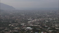 Densely Built Up Area Near Naples With Motorway And Greenhouses