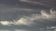Wispy Cirrus Clouds In Blue Sky Near Ischia Island