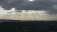 Dramatic Sun Streaks Over Montemerano
