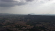 Dramatic Sun Streaks Over Montemerano