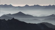 Over The Alps At Dusk