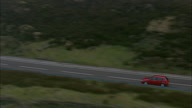 Red Car On A57 At Dawn