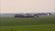 Farms Amongst A Sea Of Maize