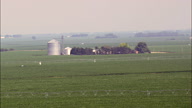 Farms Amongst A Sea Of Maize