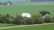 Farms Amongst A Sea Of Maize