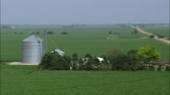 Farms Amongst A Sea Of Maize