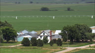 Farms Amongst A Sea Of Maize