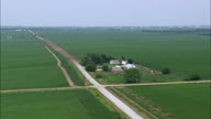 Farms Amongst A Sea Of Maize