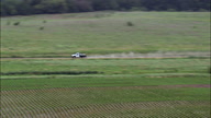 Pickups On Dirt Road