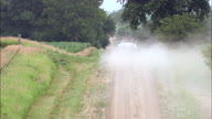 Pickups On Dirt Road