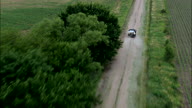 Pickups On Dirt Road