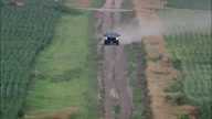 Pickups On Dirt Road