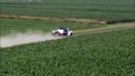 Pickups On Dirt Road