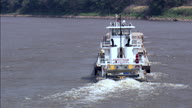 Tug And Five Barges