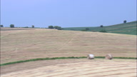 Tractor Stacking Hay Bales