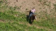 Rounding Up A Lone Cow And Calf