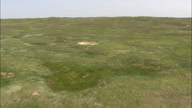 Flight Very Fast And Low Over Grassland And Sandhills